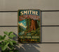 A vintage-style metal sign for the Smithe Redwoods State Natural Reserve in California, featuring a scenic illustration of a forest and a river.