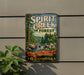 A vintage metal sign for Spirit Creek Forest in Georgia, featuring a scenic illustration of a forest with a waterfall.