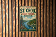 A vintage-style metal sign promoting St. Croix State Forest in Minnesota, featuring a scenic illustration of a forest and a lake.