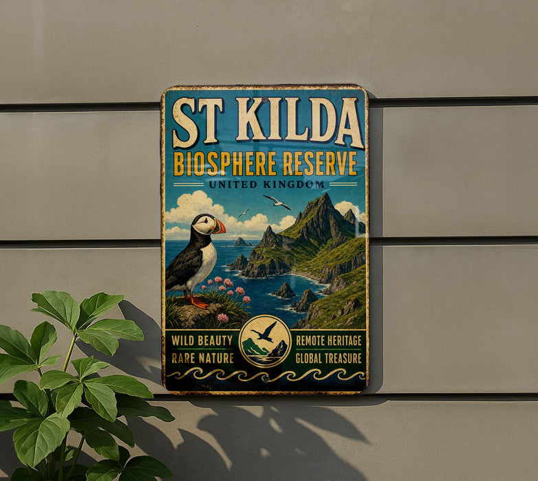 A vintage-style metal sign for St Kilda Bioscape Reserve, featuring a puffin bird and a scenic landscape.