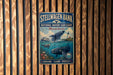 a vintage metal sign for the Stellwagen Bank National Marine Sanctuary in Massachusetts, with a whale and other marine life depicted in the background.