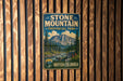 A vintage-style metal sign for Stone Mountain Provincial Park in British Columbia, Canada, featuring a scenic mountain landscape.