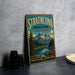 A vintage-style metal sign for Strathcona Provincial Park in British Columbia, Canada, featuring a scenic mountain landscape.
