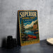 A vintage-style sign for the Superior National Forest in Minnesota, featuring a canoe and a scenic landscape.