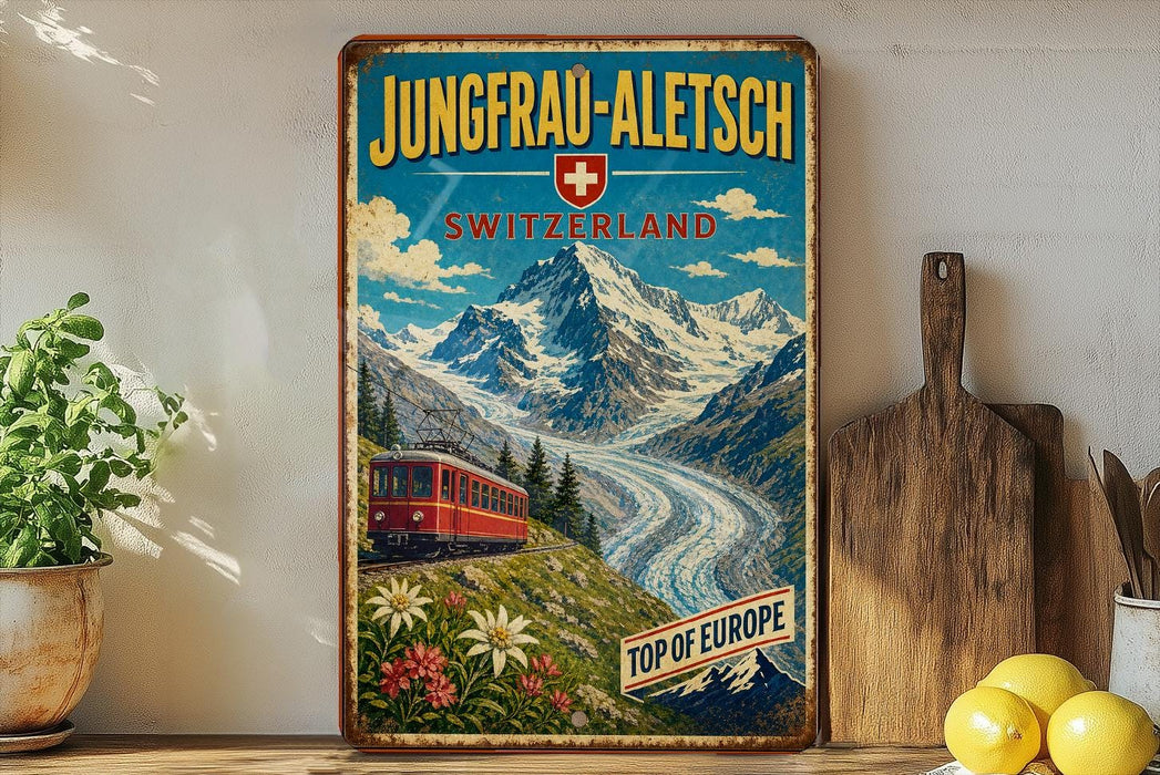 A vintage-style poster advertising Jungfrau-Aletsch, Switzerland, featuring a train traveling through a mountainous landscape with a Swiss flag.
