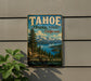 A vintage-style metal sign for Tahoe National Forest, California, featuring a scenic landscape with pine trees, mountains, and a lake.