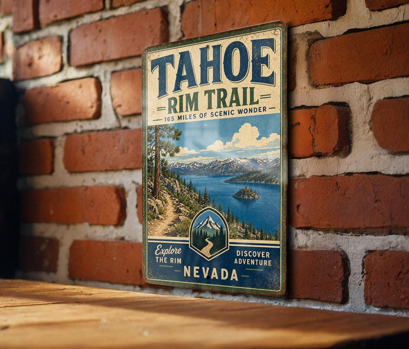 A vintage-style metal sign for the Tahoe Rim Trail in Nevada, featuring a scenic mountain landscape and a trail leading to a lake.