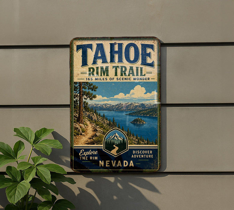 A vintage-style metal sign for the Tahoe Rim Trail in Nevada, featuring a scenic mountain landscape and a trail leading to a lake.