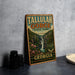 A vintage metal sign for Tallulah Gorge State Park in Georgia, featuring a scenic illustration of the park's waterfall and surrounding landscape.