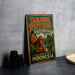 A vintage-style metal sign advertising Tanjung Puting National Park in Kalimantan, Indonesia, featuring an illustration of an orangutan in a lush, green forest setting.