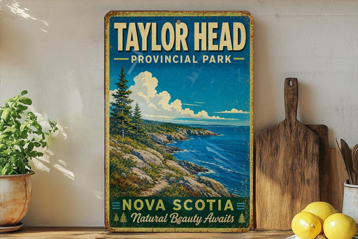 A vintage-style metal sign for Taylor Head Provincial Park in Nova Scotia, featuring a scenic coastal landscape with pine trees and a blue sky with clouds.