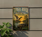 A vintage-style metal sign for the Tensas River National Wildlife Refuge in Louisiana, featuring an illustration of a bird and a crocodile in a natural setting.