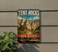 A vintage-style sign for the Tent Rocks Trail in New Mexico, featuring a scenic illustration of the rock formations and desert landscape.