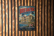 A vintage metal sign for "The Breakers" in Rhode Island, featuring a large illustration of a mansion with a river and flowers in the foreground.