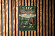 A vintage-style metal sign for the "Last Green Valley National Heritage Corroborator" in Connecticut, featuring a scenic landscape with a river, buildings, and a church.
