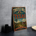 A vintage-style metal sign for Thistle Hill, Texas, featuring a scenic countryside landscape with a windmill and a house.