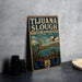 A vintage-style sign for the Tijuanan Slough National Wildlife Refuge in California, featuring illustrations of various wildlife species.