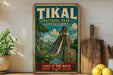 A vintage-style sign for the Tikal National Park in Guatemala, featuring an illustration of the Mayan ruins of Tikal.