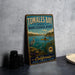 A vintage metal sign for Tomales Bay, California's State Marine Ecological Reserve, featuring an illustration of a person kayaking in the bay.