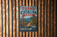 A vintage metal sign advertising the Trans-Catalina Trail in Catalina Island, California.