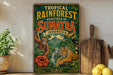 A vintage-style poster advertising the "Tropical Rainforest Heritage of Sumatra, Indonesia" featuring an orangutan, a tiger, and a waterfall.