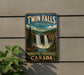 A vintage-style sign for Twin Falls, a waterfall located in Northwest Territories, Canada.