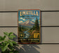 A vintage-style metal sign for the Umatilla National Forest in Oregon, featuring a scenic mountain landscape and promoting outdoor activities.