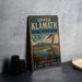 A vintage-style metal sign for Upper Klamath National Wildlife Refuge, featuring an illustration of a bird and a mountain landscape.