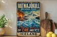 A vintage-style metal sign for Vatnajokull National Park, featuring a scenic image of a volcano and ice-covered mountains.