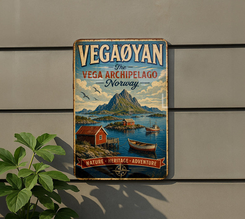 A vintage-style metal sign with the text "VEGA ARCHIPELAGO NORWAY" and a scenic illustration of a coastal landscape with boats, mountains, and a small red building.
