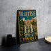 A vintage-style sign for Villa d'Este in Tivoli, Italy, featuring an illustration of the villa and a fountain.