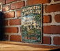 A vintage-style metal sign for the Wadsworth-Longfellow House in Maine, featuring an illustration of the house and the text "Wadsworth-Longfellow House" and "Step into America's Literary Heritage".