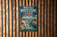 A vintage-style metal sign for Waitaki Whitestone Park in New Zealand, featuring a scenic landscape with mountains, a river, and a waterfall.