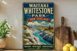 A vintage-style sign for Waitaki Whitestone Park in New Zealand, featuring a scenic landscape with a river and mountains.