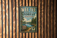 A vintage-style poster for the Wee Tee State Forest in South Carolina, featuring a scenic landscape with a lake and trees.