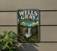 A vintage-style metal sign for Wells Gray Provincial Park in British Columbia, featuring a scenic image of a waterfall surrounded by pine trees.