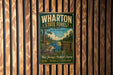 A vintage metal sign for Wharton State Forest in New Jersey, featuring a scenic illustration of a forest and a river.