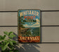 A vintage-style metal sign for Whitaker Point Trail in Arkansas, featuring a scenic landscape with a cliff and river.