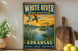 A vintage-style metal sign for the White River National Wildlife Refuge in Arkansas, featuring an illustration of ducks and a sunset over a river.