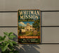 A metal sign on a wall that reads "WHITMAN MISSION NATIONAL HISTORIC SITE WASHINGTON" with a picture of a building and a wagon.