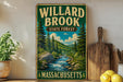 A vintage-style sign for Willard Brook State Forest in Massachusetts, featuring a scenic illustration of a forest and a river.