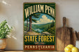 A vintage-style sign for William Penn State Forest in Pennsylvania, featuring a scenic landscape with pine trees, mountains, and a river.
