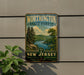 A vintage-style metal sign for WorthINGTON, STATE FOREST, New Jersey, featuring a scenic landscape with pine trees, a lake, and mountains.