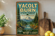 A vintage-style sign for Yacolt Burn State Forest in Washington, featuring a scenic mountain landscape with pine trees and a river.
