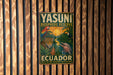 A vintage-style metal sign for Yasuni Biosphere Reserve, featuring an illustration of a jaguar, parrot, and dolphin, with the text "Yasuni Biosphere Reserve Ecuador" and "One of the most biodiverse places on earth".