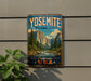 A vintage-style sign for Yosemite National Park, featuring a scenic mountain landscape with a river and pine trees.