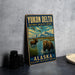 A vintage-style sign for Yukon Delta National Wildlife Refuge in Alaska, featuring an illustration of moose, bears, and mountains.