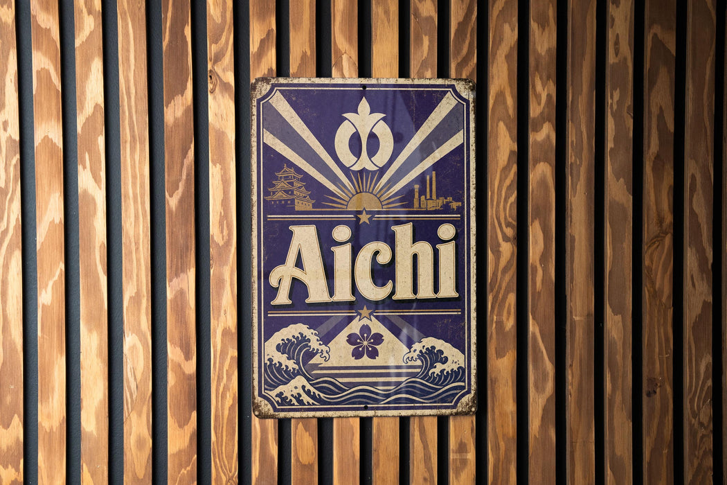 A decorative sign with the word "Aichi" displayed prominently in the center, surrounded by various Japanese-style illustrations and designs.