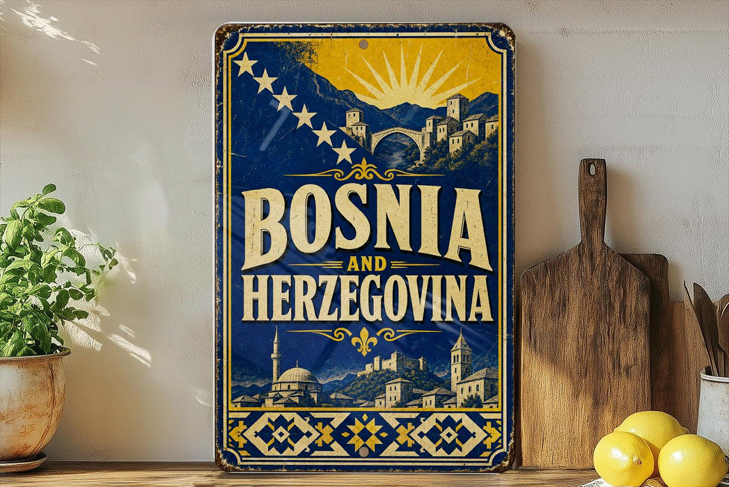 a vintage-style metal sign with the text "Bosnia and Herzegovina" prominently displayed. The sign is set against a backdrop of a scenic illustration of a town and mountains, with a sunburst design above. The sign is placed on a wooden surface, and there are some potted plants and kitchen utensils visible in the background.