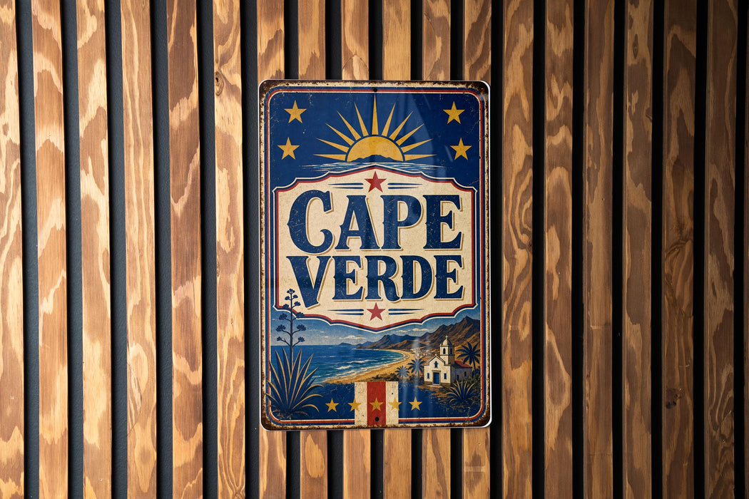 A vintage metal sign with the text "CAPE VERDE" displayed prominently in the center, surrounded by a sun and star motif.